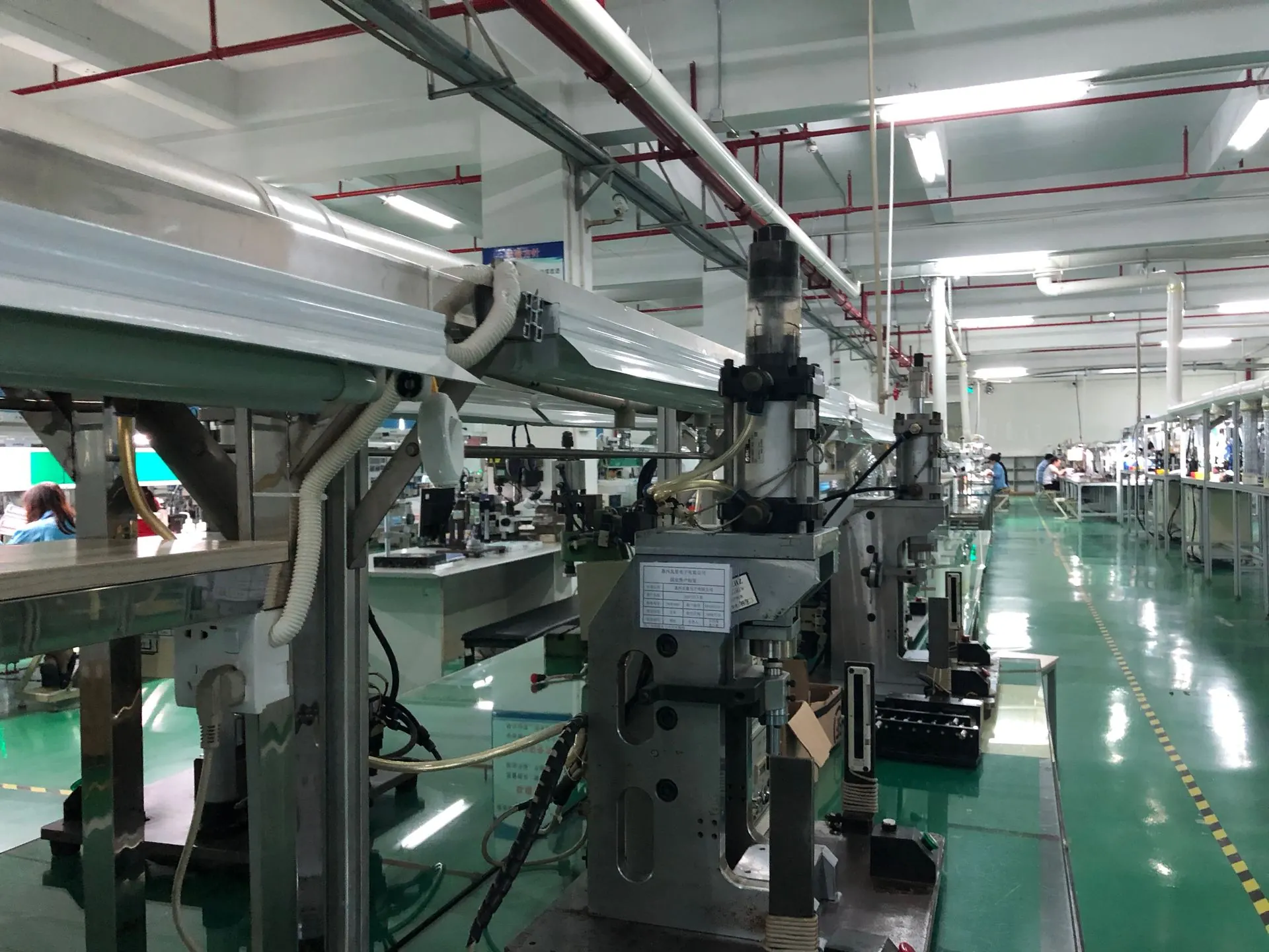 Production line scene showing station workflow and equipment layout (IMG_4504)